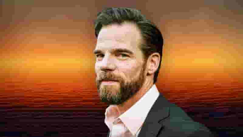 Who Is Gregory James Cohan? 5 Things to Know About Atlas Movie's Smith Actor